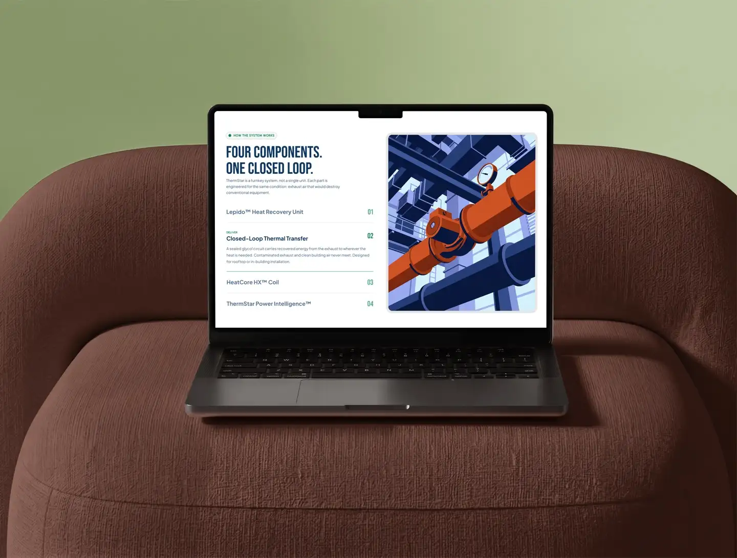 Laptop on a boucle armchair, showing a closed-loop heat recovery site